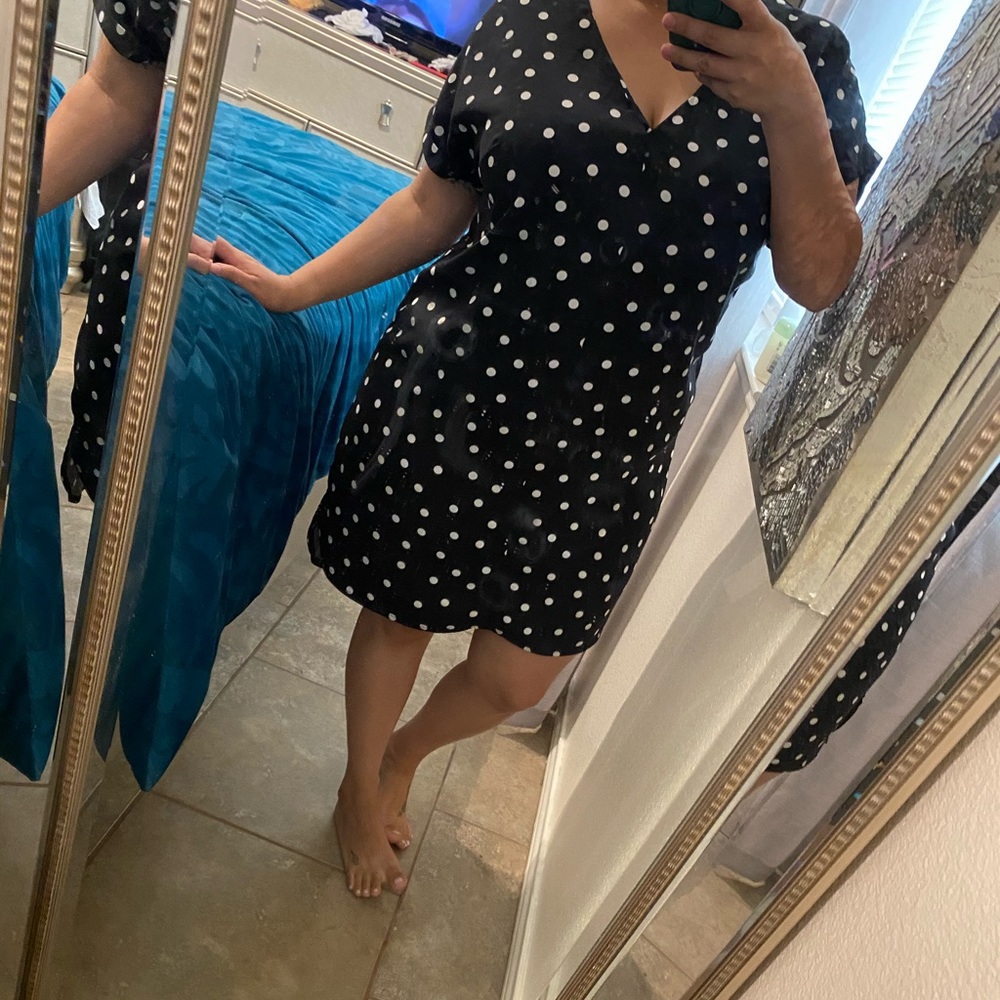 Black dress with white polka dots
